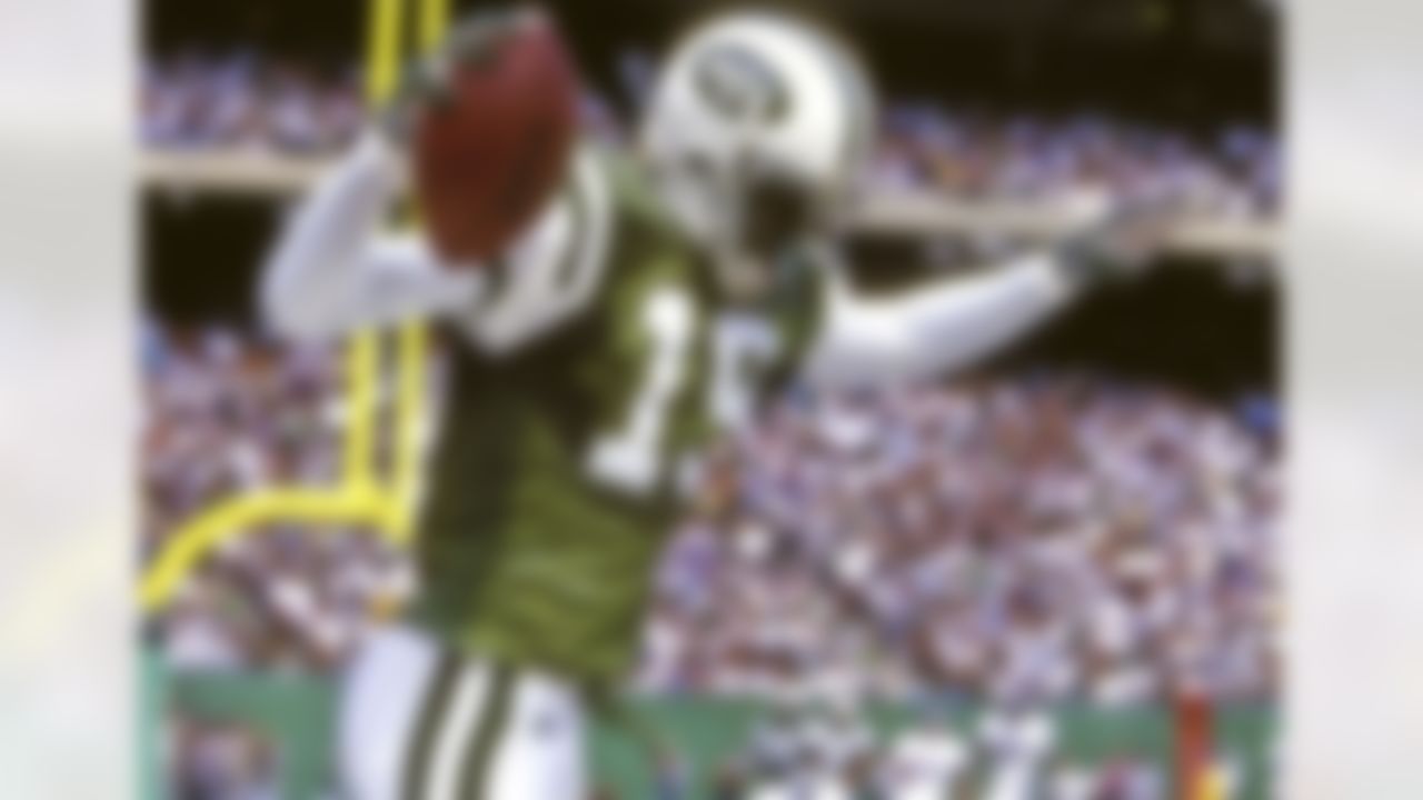 New York Jets wide receiver Keyshawn Johnson (19) celebrates a touchdown in 1998.