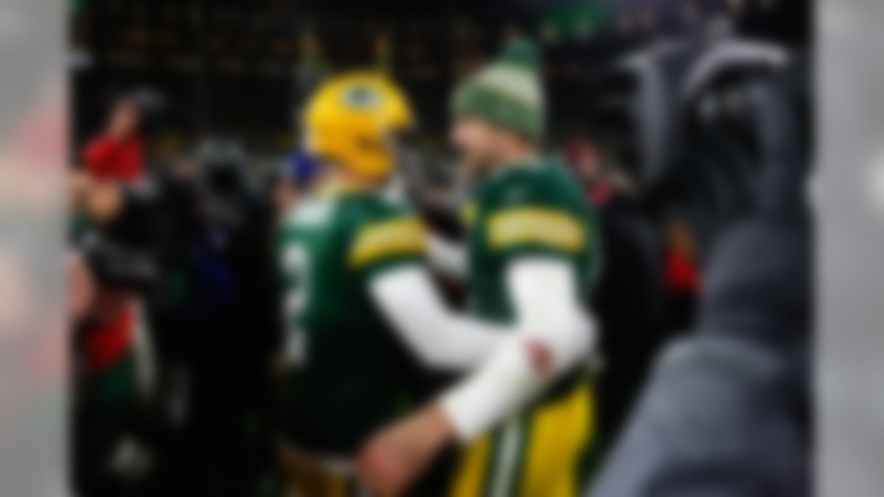 Green Bay Packers kicker Mason Crosby (2) hugs quarterback Aaron Rodgers (12) after kicking the winning field goal following an NFL football game against the San Francisco 49ers on Monday, Oct. 15, 2018, in Green Bay, Wis. Green Bay won 33-30.