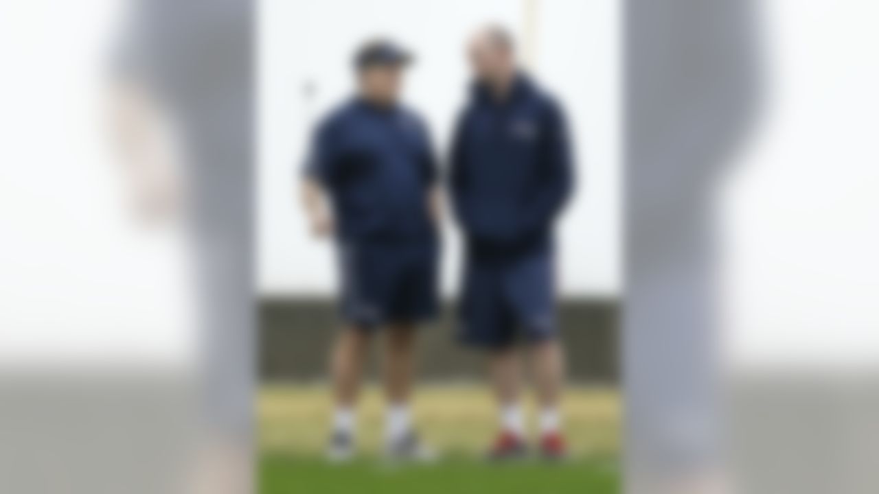 New England Patriots head coach Bill Belichick, left, talks with team chaplain Jack Easterby during practice Friday, Jan. 30, 2015, in Tempe, Ariz. The Patriots play the Seattle Seahawks in NFL football Super Bowl XLIX Sunday, Feb. 1. (AP Photo/Mark Humphrey)
