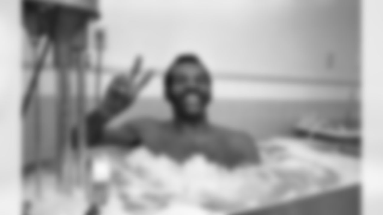 Dallas Cowboys cornerback Herb Adderley soaks in the whirlpool bath and flashes a peace sign and big smile in Dallas after being named NFL Defensive Player of the Week for his game against the Philadelphia Eagles, Sept. 29, 1971. The 11-year veteran snagged three interceptions in the game Sunday. (AP Photo/Ferd Kaufman)