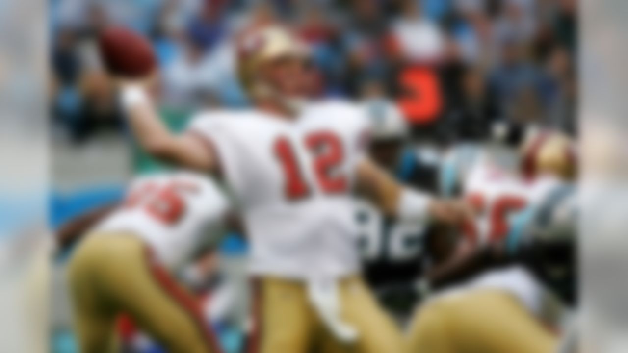 CHARLOTTE, NC - DECEMBER 02: Trent Dilfer #12 of the San Francisco 49ers throws a pass against the Carolina Panthers during their game at Bank of America Stadium on December 2, 2007 in Charlotte, North Carolina. (Photo by Streeter Lecka/Getty Images)