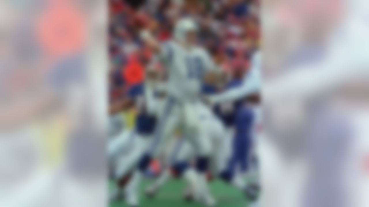 Indianapolis Colts quarterback Peyton Manning, (18), passes during the third quarter of the game against the Buffalo Bills at Ralph Wilson Stadium on Sunday, Jan. 2, 2000 in Orchard Park, N.Y. (AP Photo/Mike Groll)