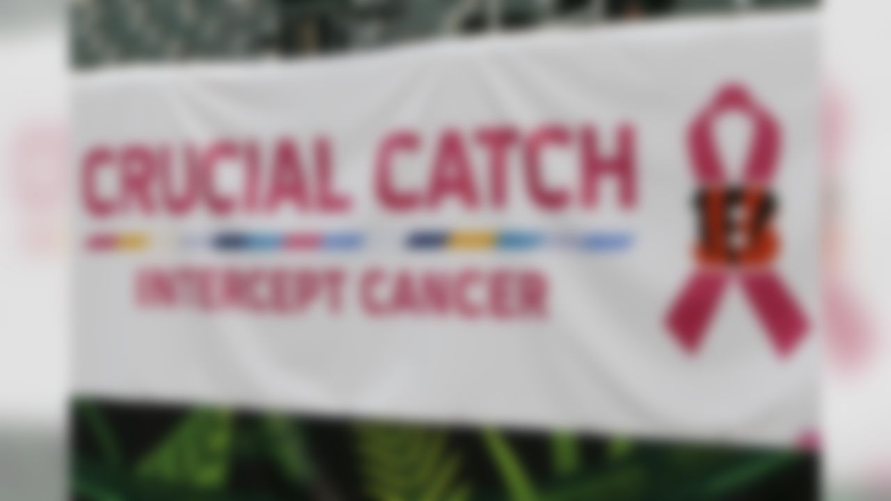 A "Crucial Catch" Cancer Awareness banner is displayed before an NFL football game between the Cincinnati Bengals and the Buffalo Bills, Sunday, Oct. 8, 2017, in Cincinnati.