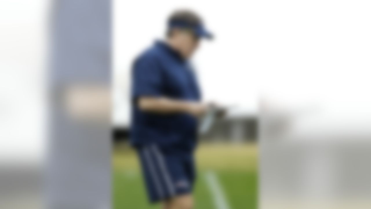 New England Patriots head coach Bill Belichick looks over notes during practice Friday, Jan. 30, 2015, in Tempe, Ariz. The Patriots play the Seattle Seahawks in NFL football Super Bowl XLIX Sunday, Feb. 1. (AP Photo/Mark Humphrey)