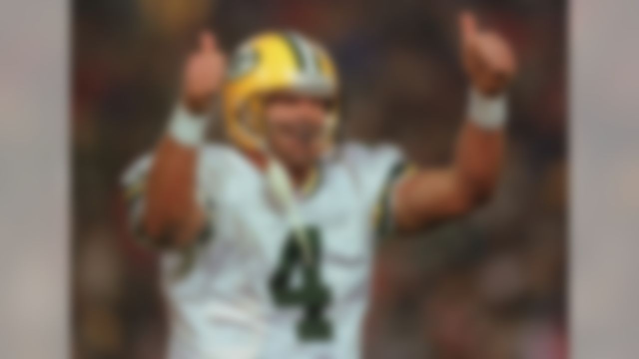 Green Bay Packers quarterback Brett Favre celebrates a third quarter touchdown during their 28-10 win over the New England Patriots at Foxboro Stadium in Foxboro, Mass., Monday, Oct. 27, 1997. (AP Photo/Winslow Townson)