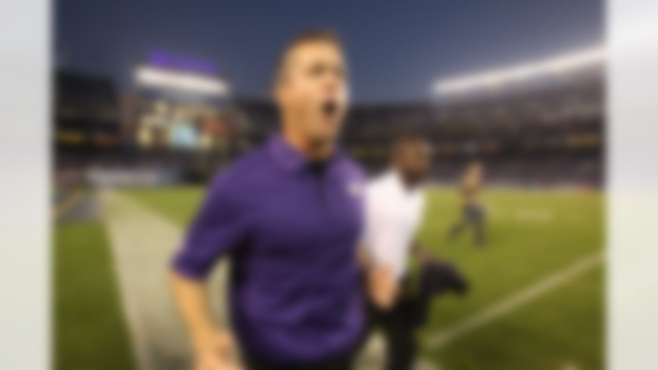 Head coach John Harbaugh of the Baltimore Ravens celebrates against after defeating the San Diego Chargers during an NFL game on Sunday, November 25, 2012 in San Diego, CA. (AP Photo/Jed Jacobsohn)
