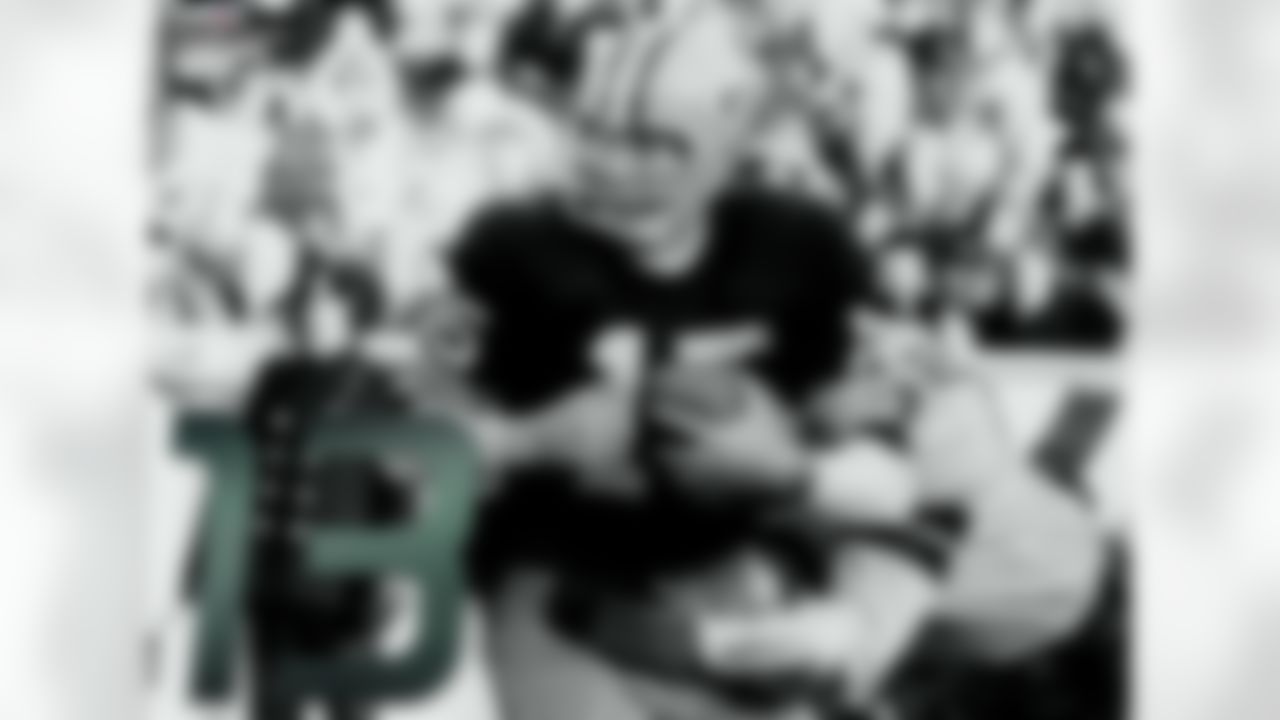 The 1967 NFL Championship Game still stands at the coldest game in NFL history. Despite the field temperature of 13 degrees below zero, more than 50,000 fans packed Lambeau Field on New Year's Eve to watch the Packers take on the Cowboys. With a wind chill of -48 degrees fahrenheit, the field was covered in ice and visiting quarterback Don Meredith struggled, completing only 40 percent of his passes for 59 yards with no touchdowns and an interception. Packers quarterback Bart Starr led a drive for the ages, ending with a touchdown on a QB sneak with only 13 seconds left to give the Packers a 21-17 victory.