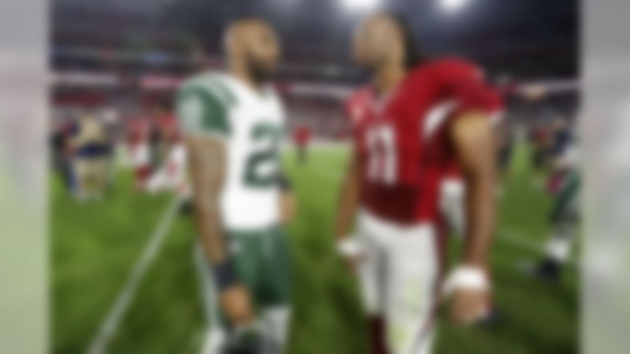 New York Jets running back Matt Forte (22) and Arizona Cardinals wide receiver Larry Fitzgerald (11) talk after an NFL football game, Monday, Oct. 17, 2016, in Glendale, Ariz. The Cardinals defeated the Jets, 28-3. (Ryan Kang/NFL)