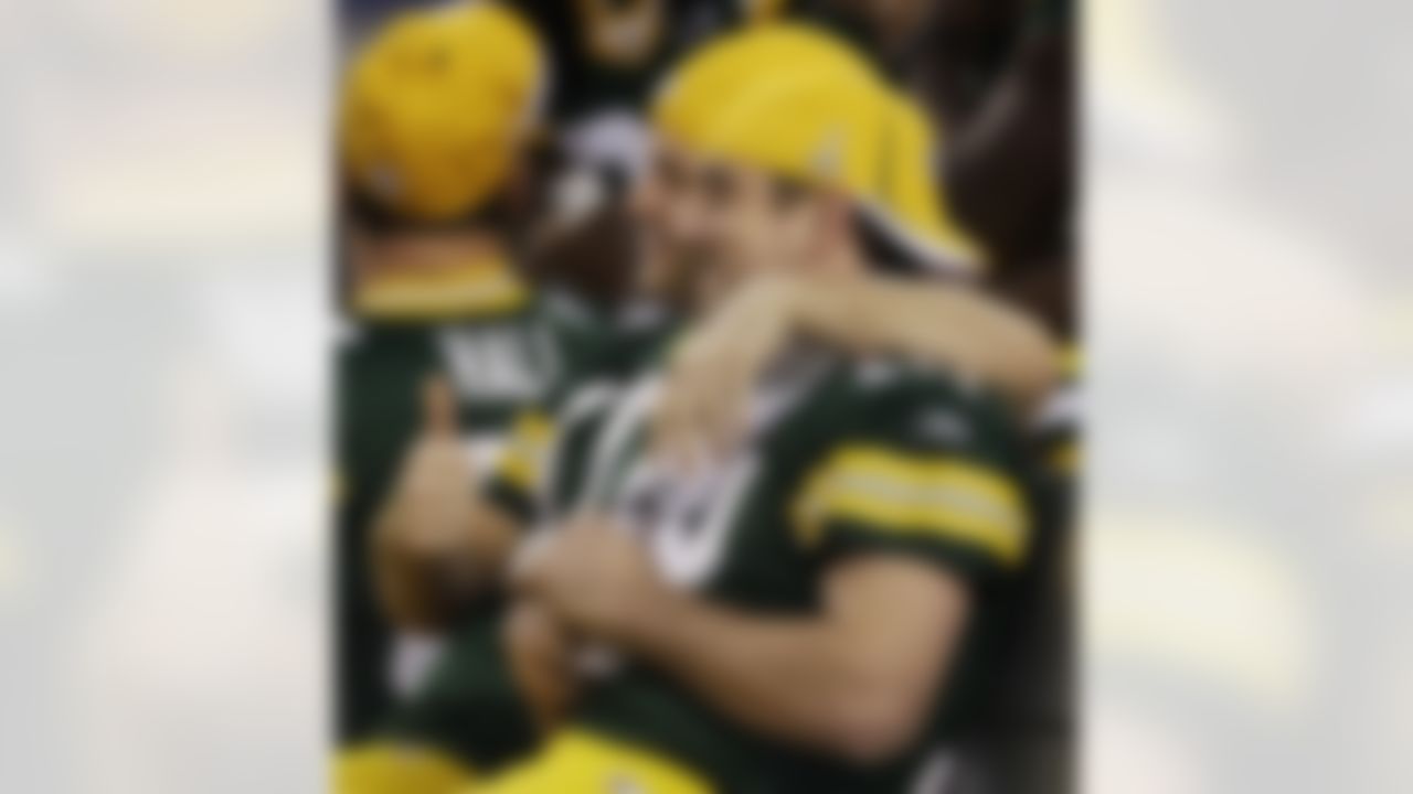 Green Bay Packers' Aaron Rodgers, right, and Matt Flynn pose for a picture during media day for NFL football Super Bowl XLV Tuesday, Feb. 1, 2011, in Arlington, Texas. (AP Photo/Charlie Riedel)