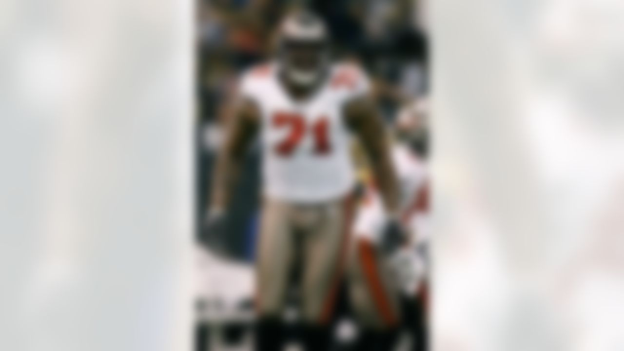 NEW ORLEANS - DECEMBER 02: Jovan Haye #71 of the Tampa Bay Buccaneers celebrates after making a tackle against the New Orleans Saints on his way to scoring a touchdown on December 2, 2007 at the Louisiana Superdome in New Orleans, Louisiana. The Buccaneers defeated the Saints 27-23. (Photo by Chris Graythen/Getty Images)