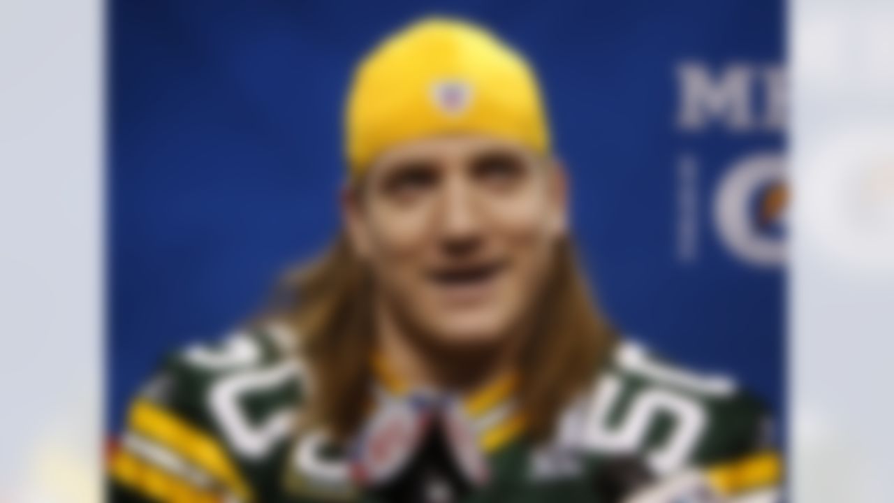 Green Bay Packers' A.J. Hawk answers a question during media day for NFL football Super Bowl XLV Tuesday, Feb. 1, 2011, in Arlington, Texas. (AP Photo/Mark Humphrey)
