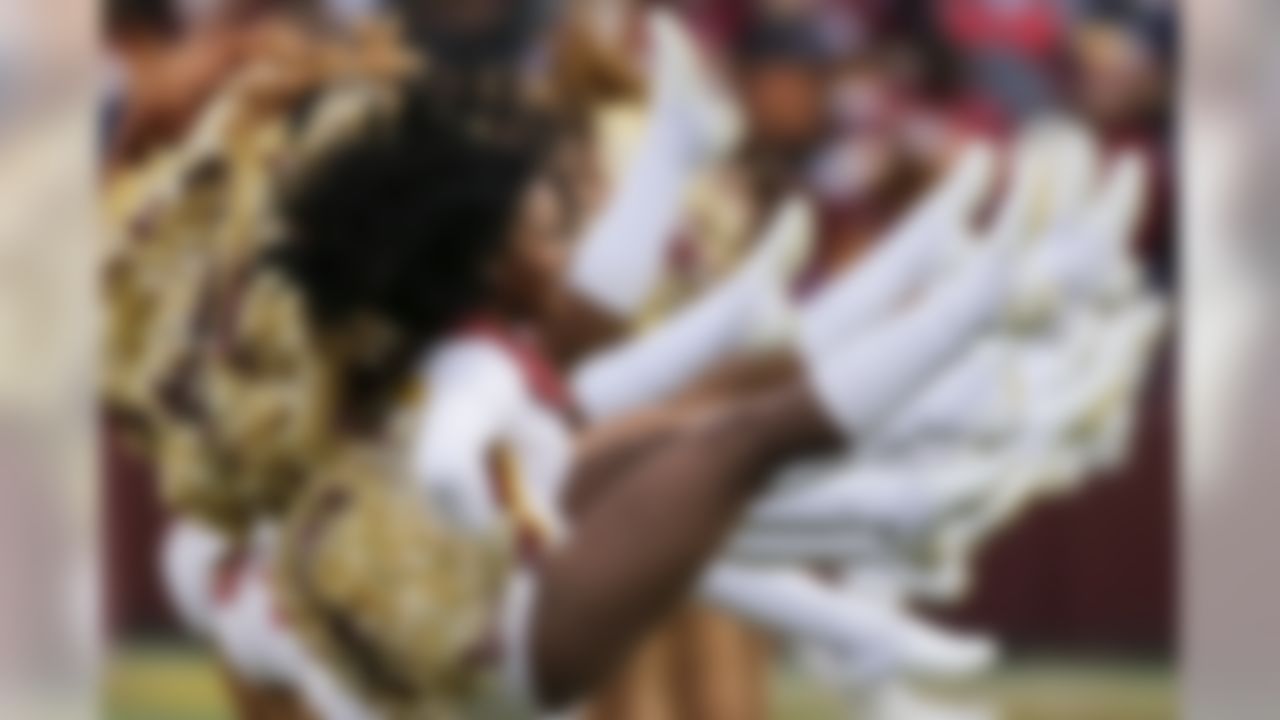 The Washington Redskins cheerleaders perform before an NFL wild card playoff football game against the Green Bay Packers in Landover, Md., Sunday, Jan. 10, 2016. (AP Photo/Mark Tenally)