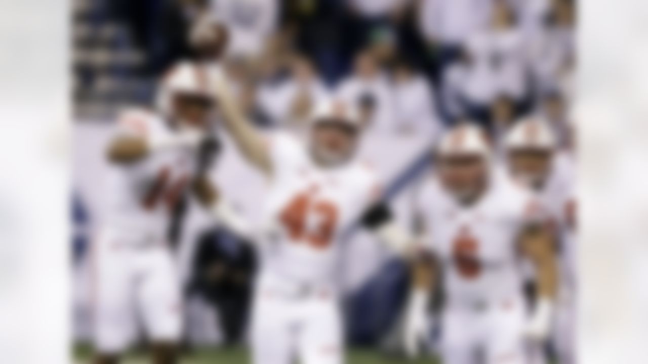 Wisconsin's Ryan Connelly (43] celebrates along side teammates D'Cota Dixon (14) Garret Dooley after running back a Penn State fumble for a touchdown during the first half of the Big Ten championship NCAA college football game Saturday, Dec. 3, 2016, in Indianapolis. (AP Photo/Michael Conroy)