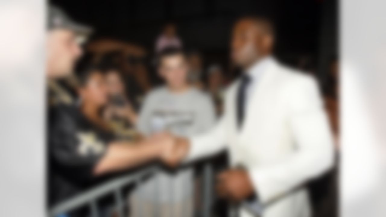 New Orleans Saints running back Reggie Bush greets fans after receiving his Super Bowl XLIV ring in New Orleans, Wednesday, June 16, 2010. The Saints defeated the Indianapolis Colts 31-17 in Super Bowl XLIV to attain the first championship in franchise history. (AP Photo/Patrick Semansky)