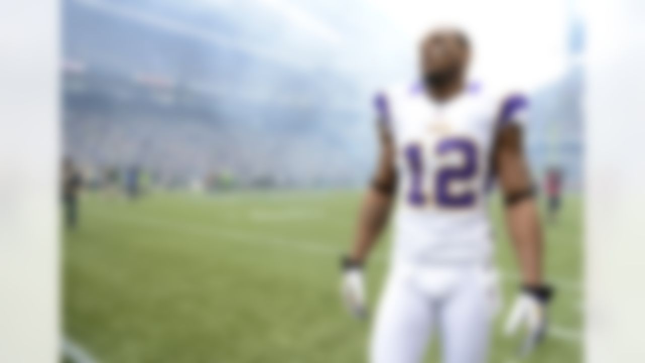 Minnesota Vikings wide receiver Percy Harvin (12) collects his thoughts during an NFL football game against the Seattle Seahawks on Sunday, Nov. 4, 2012, in Seattle. The Seahawks won the game, 30-20. (AP Photo/Greg Trott)