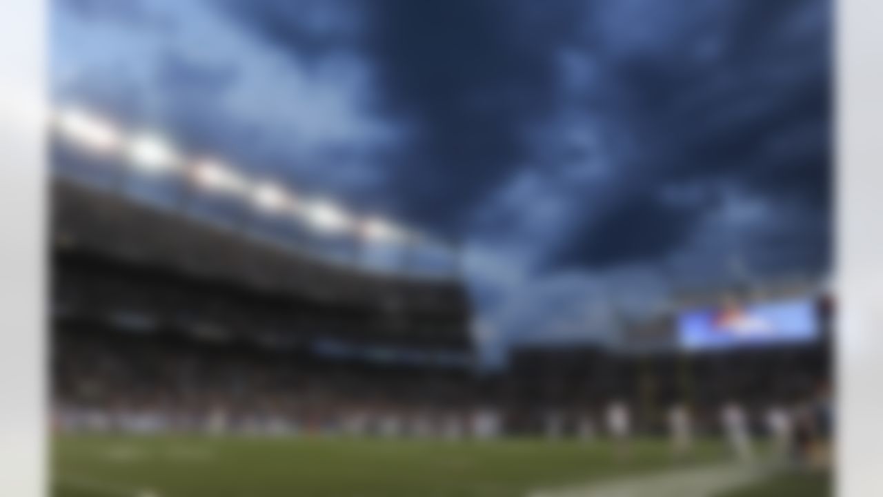 Storm clouds move in over Sports Authority Field at Mile High Stadium in the second quarter of a preseason NFL football game between the Buffalo Bills and Denver Broncos, Saturday, Aug. 20, 2011, in Denver. (AP Photo/Chris Schneider)