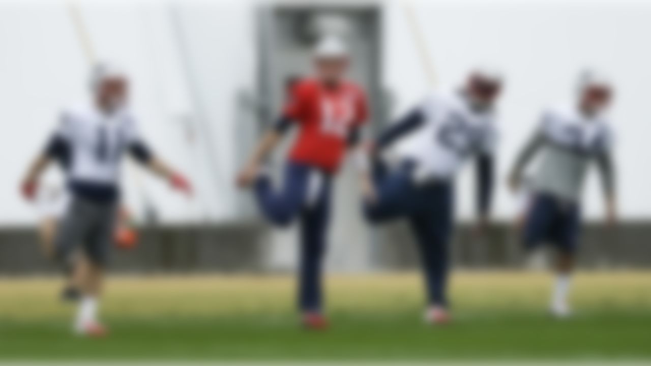 New England Patriots wide receiver Julian Edelman (11), quarterback Tom Brady (12), running back LeGarrette Blount (29)and running back Shane Vereen (34) stretch during practice Friday, Jan. 30, 2015, in Tempe, Ariz. The Patriots play the Seattle Seahawks in NFL football Super Bowl XLIX Sunday, Feb. 1. (AP Photo/Mark Humphrey)