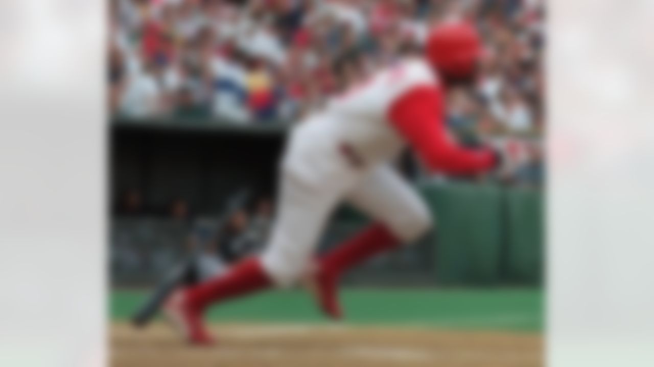 Cincinnati Reds' Deion Sanders gets his 500th career hit, an RBI single off of Chicago White Sox pitcher Danny Darwin, in the third inning Saturday, June 14, 1997, in Cincinnati. Joe Oliver scored on the play. Cincinnati won 5-1. (AP Photo/David Kohl)