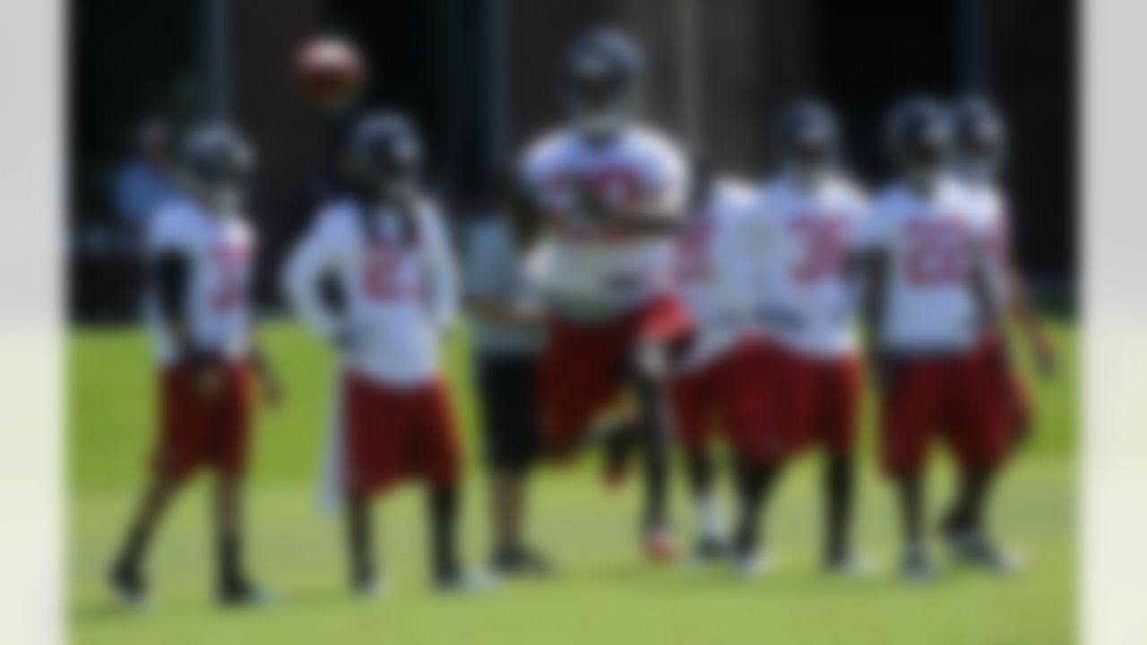 Atlanta Falcons cornerback Darrin Walls (29) works out during a training camp session, Saturday, July, 28, 2012. (AP Photo/John Amis)