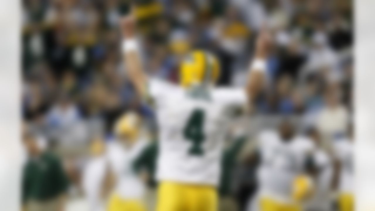 DETROIT , MI - NOVEMBER 22: Brett Favre #4 of the Green Bay Packers reacts after a third quarter touchdown against the Detroit Lions on November 22, 2007 at Ford Field in Detroit, Michigan. Green Bay won the game 37-26. (Photo by Gregory Shamus/Getty Images)
