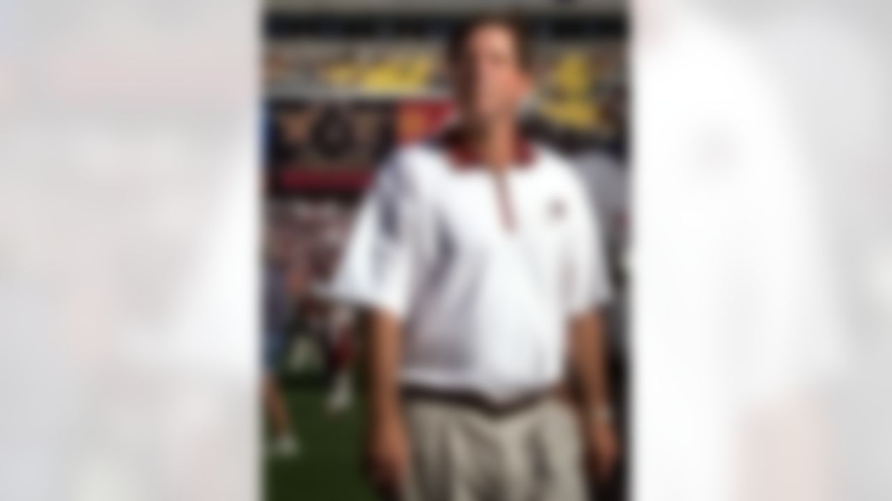 Norv Turner's '99 Redskins made the playoffs for the first time in seven seasons. Yet, that campaign got off to an inauspicious start. The Redskins blew a 35-14 fourth-quarter lead when Troy Aikman (362 yards, five TD, three INT) got hot. The Cowboys tied the score at 35 with 21 unanswered points, then a bobbled snap on the Redskins' game-winning field goal attempt (a problem that hurt the team in the playoffs that year) pushed the game to overtime. On third-and-2 from the Cowboys' 24-yard line, Aikman sucked the whole defense in on play-action, leaving Rocket Ismail open by a country mile; 76 yards later the Cowboys moved to 1-0 and the Redskins dropped to 0-1. (AP Photo/Khue Bui)