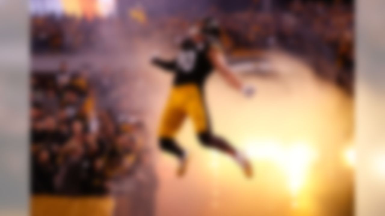 Pittsburgh Steelers linebacker T.J. Watt (90) runs onto the field before an NFL football game against the Los Angeles Chargers, Sunday, Dec. 2, 2018, in Pittsburgh.