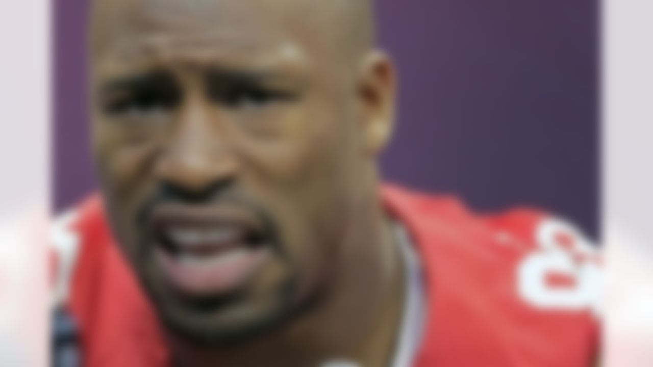 San Francisco 49ers tight end Vernon Davis answers reporters questions during media day for the NFL Super Bowl XLVII football game Tuesday, Jan. 29, 2013, in New Orleans. (AP Photo/Charlie Riedel)