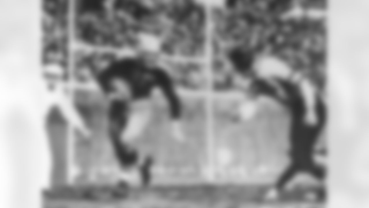 Green Bay Packers Hall of Fame running back Clarke Hinkle runs around Chicago Bears end Hampton Pool in a 27 to 30 Green Packers loss to the Chicago Bears on November 5, 1939 at Wrigley Field in Chicago, Illinois. (National Football League)