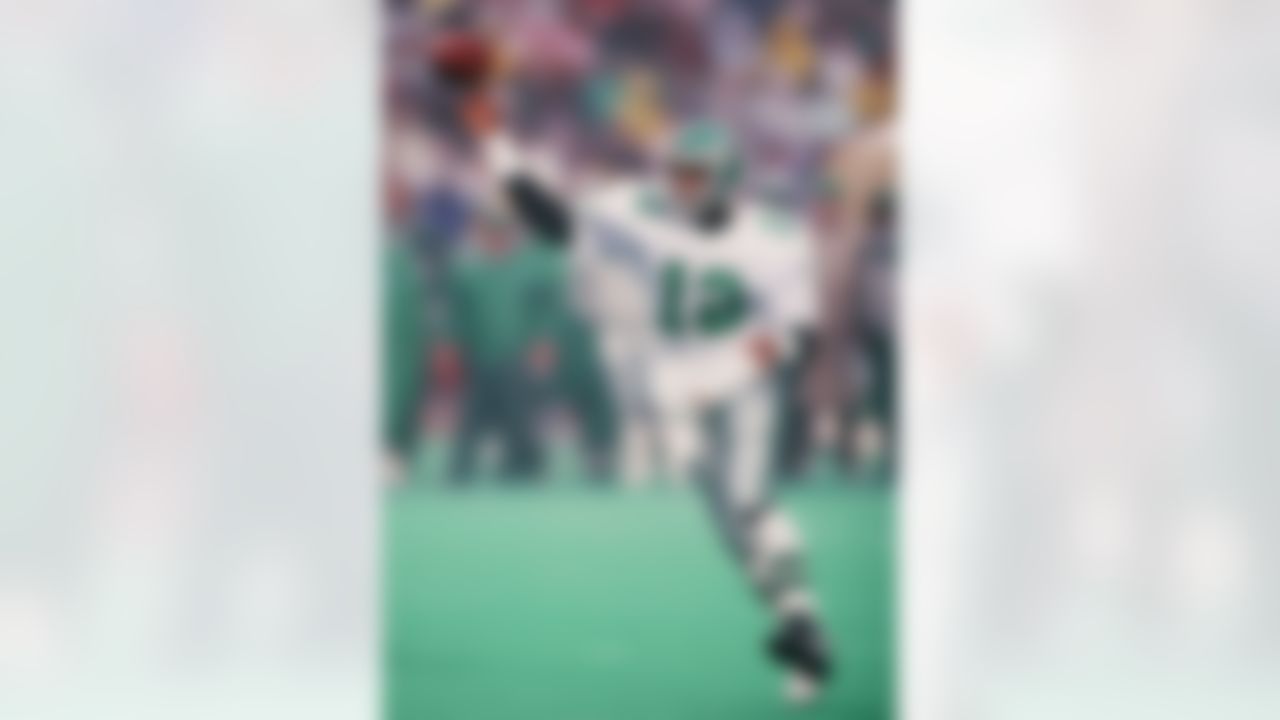 Philadelphia Eagles quarterback Randall Cunningham (12) throws a pass during the NFL football Wild Card game against the St. Louis Rams on December11, 1989 in Philadelphia, Pennsylvania. The Rams won the game 21-7. (AP Photo/Paul Spinelli)