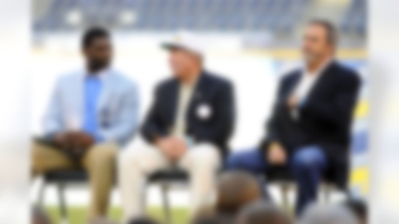 May 11, 2012; San Diego, CA, USA; Former San Diego Chargers player LaDainian Tomlinson, Former San Diego Chargers head coach Bobby Ross and Former San Diego Chargers player Dan Fouts sit on stage during a celebration of life service to remember Junior Seau at Qualcomm Stadium. Mandatory Credit: Christopher Hanewinckel-US PRESSWIRE