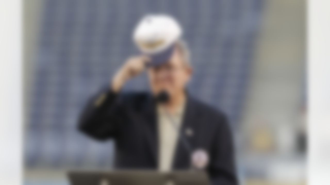 Former San Diego Chargers head coach Bobby Ross gestures with a hat while speaking during a public memorial service for football player Junior Seau at Qualcomm Stadium Friday, May 11, 2012, in San Diego. Seau committed suicide on May 2 at his Oceanside, Calif., home. He played parts of 20 seasons in the NFL, with the San Diego Chargers, Miami Dolphins and New England Patriots. (AP Photo/ Gregory Bull)
