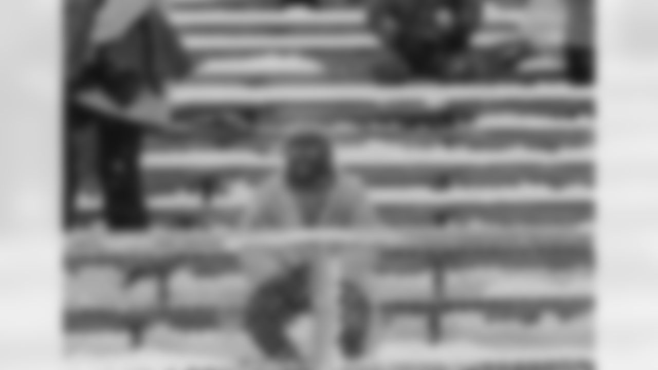 A fan comes appropriately wrapped for the National Football League championship game between the Green Bay Packers and the Cleveland Browns at Green Bay, Wisconsin on Jan. 2, 1966. New snow covered Lambeau Field before game time. (Associated Press)