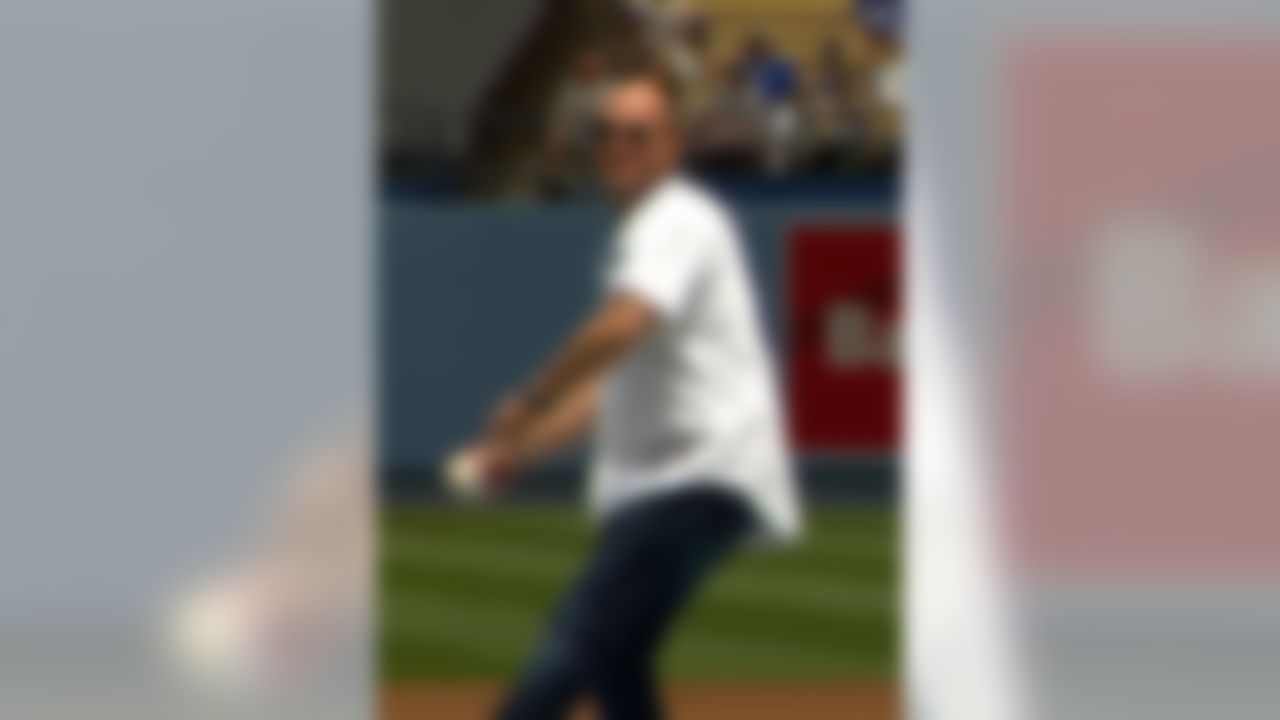 Rich Eisen throws out the first pitch at Dodger Stadium in Los Angeles, Calif., on Sunday, May 26, 2013.