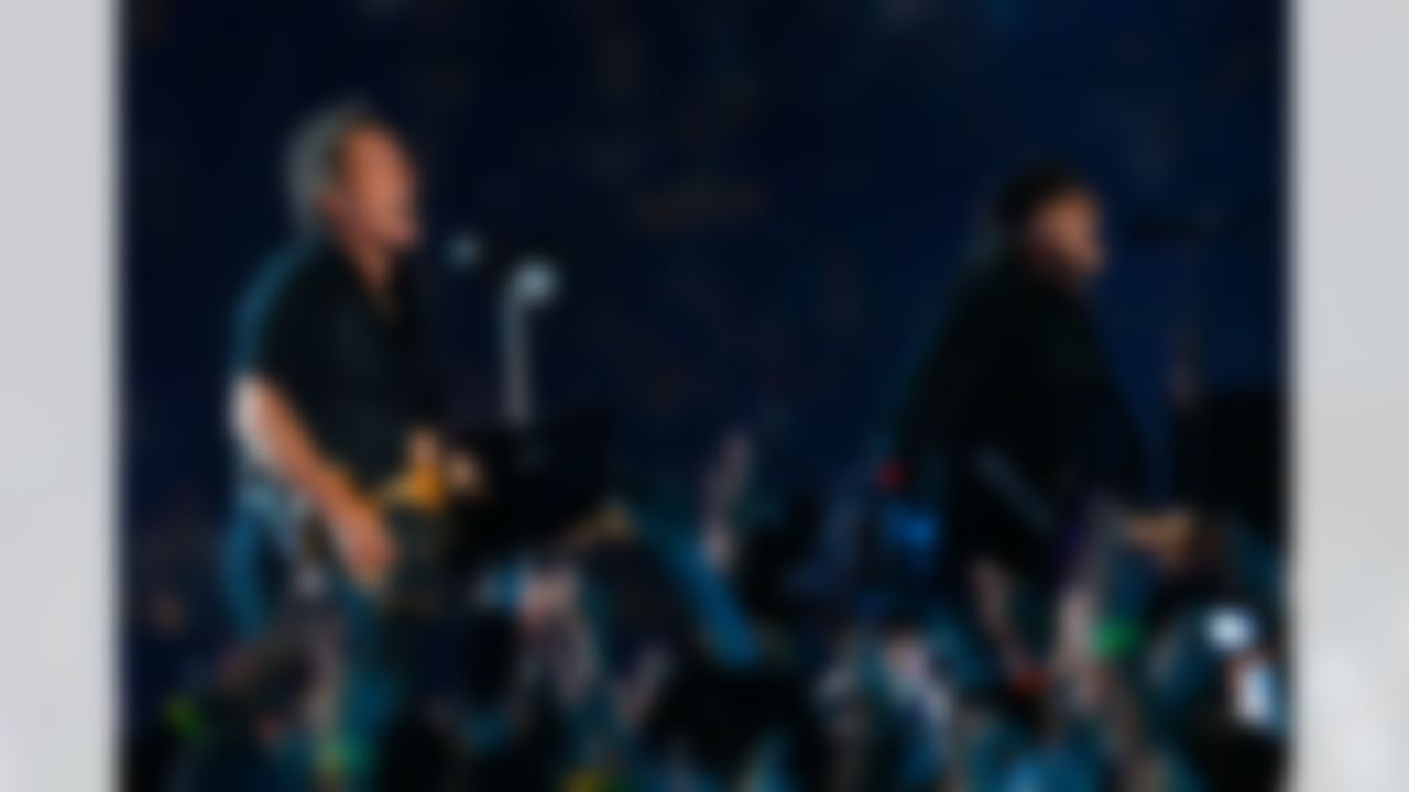 TAMPA, FL - FEBRUARY 01: Musician Bruce Springsteen and Guitarist Steven Van Zandt of the E Street Band perform at the Bridgestone halftime show during Super Bowl XLIII between the Arizona Cardinals and the Pittsburgh Steelers on February 1, 2009 at Raymond James Stadium in Tampa, Florida. (Photo by Win McNamee/Getty Images)