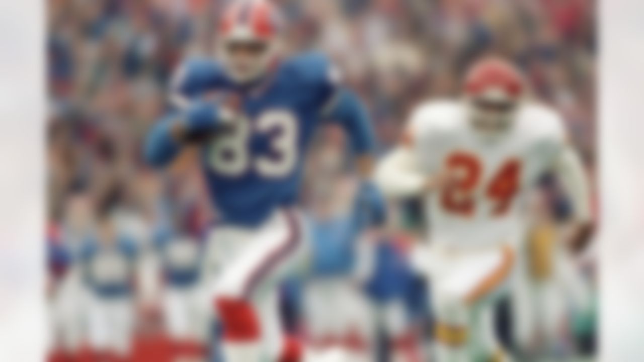 FILE - In this Jan. 15, 1992 file photo, Buffalo Bills wide receiver Andre Reed goes for a gain in an AFC playoff game against the Kansas City Chiefs. on Jan. 15, 1992 in Orchard Park, N.Y.. Reed is a finalist for the Pro Football Hall of Fame, the hall announced Friday, Jan. 11, 2013.(Mark Duncan/Associated Press)