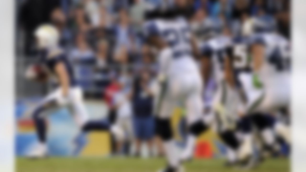 San Diego Chargers wide receiver Bryan Walters, left, runs back a kickoff for a touchdown from the end zone against the Seattle Seahawks during the second half of their preseason NFL football game at Qualcomm Stadium, Thursday, Aug. 11, 2011, in San Diego. (AP Photo/Mark J. Terrill)
