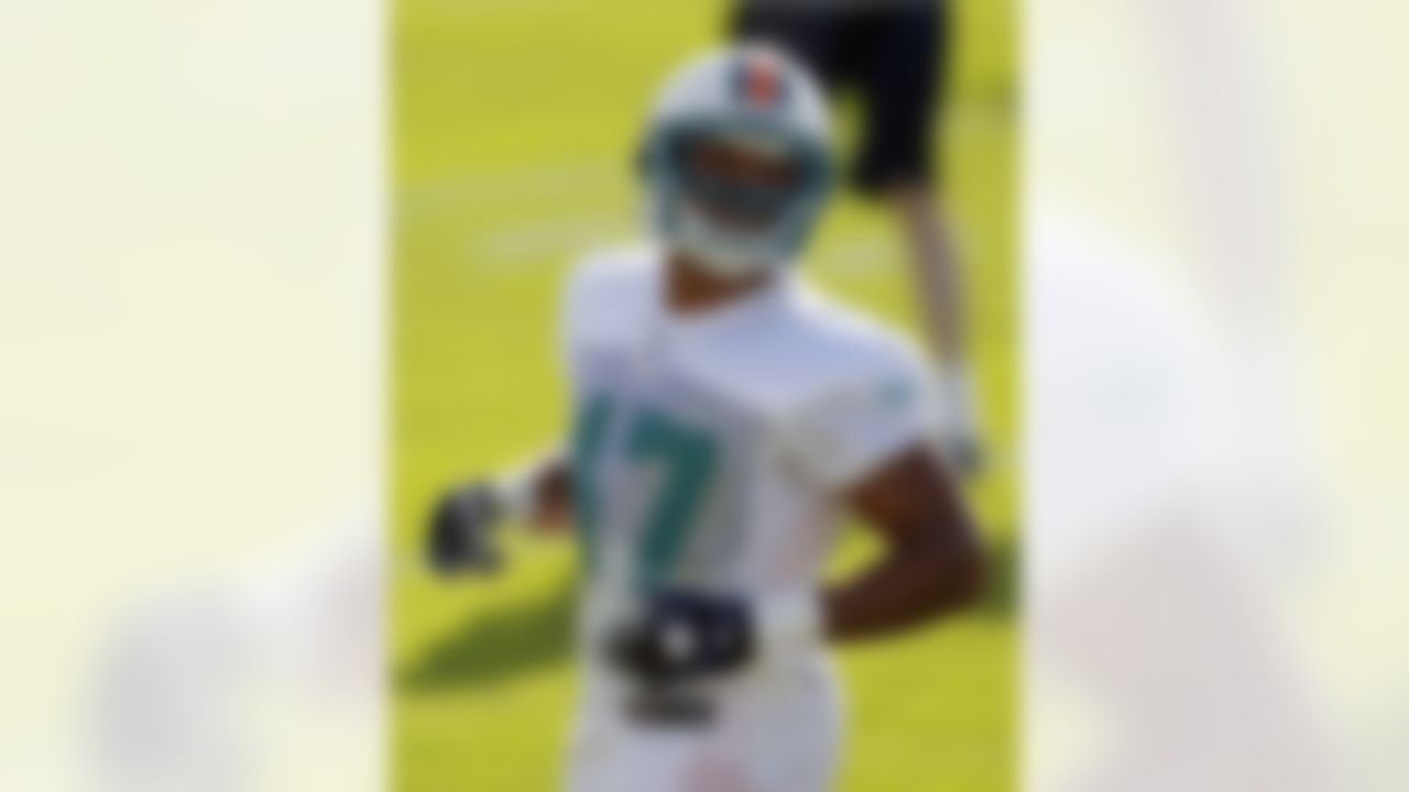 Miami Dolphins' Trenton Hughes runs during NFL football training practice in Davie, Fla., Friday, July 27, 2012. (AP Photo/Alan Diaz)