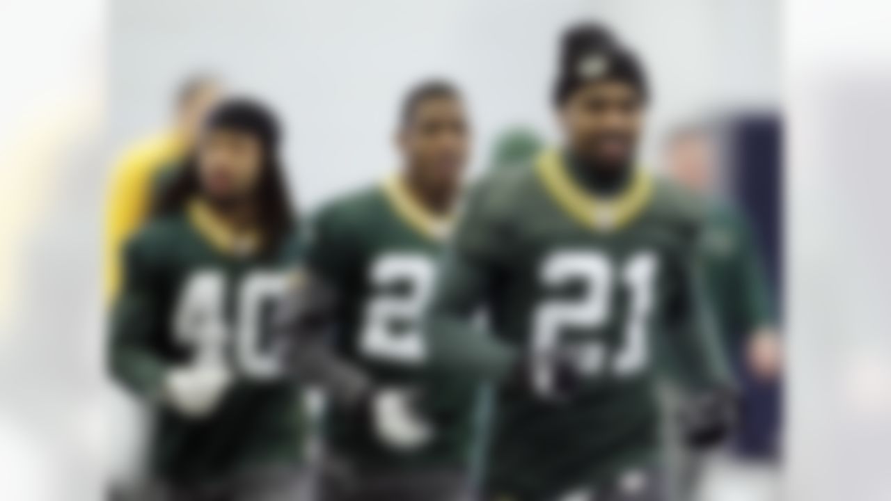 Green Bay Packers' Charles Woodson (21), Brandon Underwood, center, and Josh Gordy (40) run during during practice, Thursday, Feb. 3, 2011, in Dallas. Green Bay will face the Pittsburgh Steelers in the NFL football Super Bowl XLV Sunday. (AP Photo/Eric Gay)