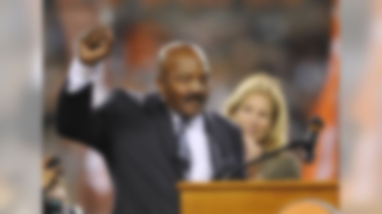 Cleveland Browns Hall of Fame running back Jim Brown acknowledges the crowd after being honored at halftime of an NFL football game between the Browns and the Buffalo Bills on Thursday, Oct. 3, 2013, in Cleveland. (AP Photo/David Richard)