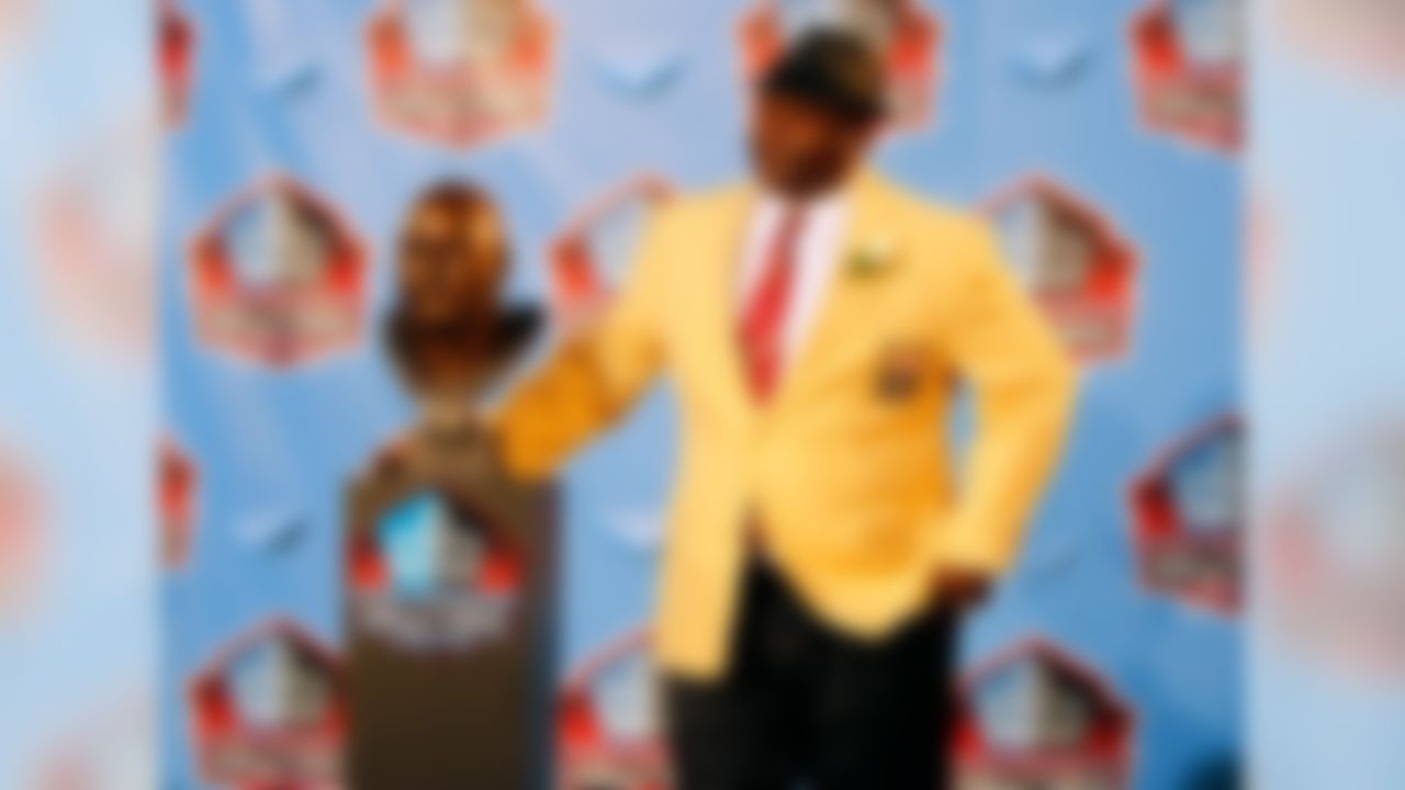Rickey Jackson poses with his bust at the 2010 Hall of Fame enshrinement at Fawcett Stadium in Canton, Ohio on Aug. 7, 2010. (AP Photos/Ben Liebenberg)