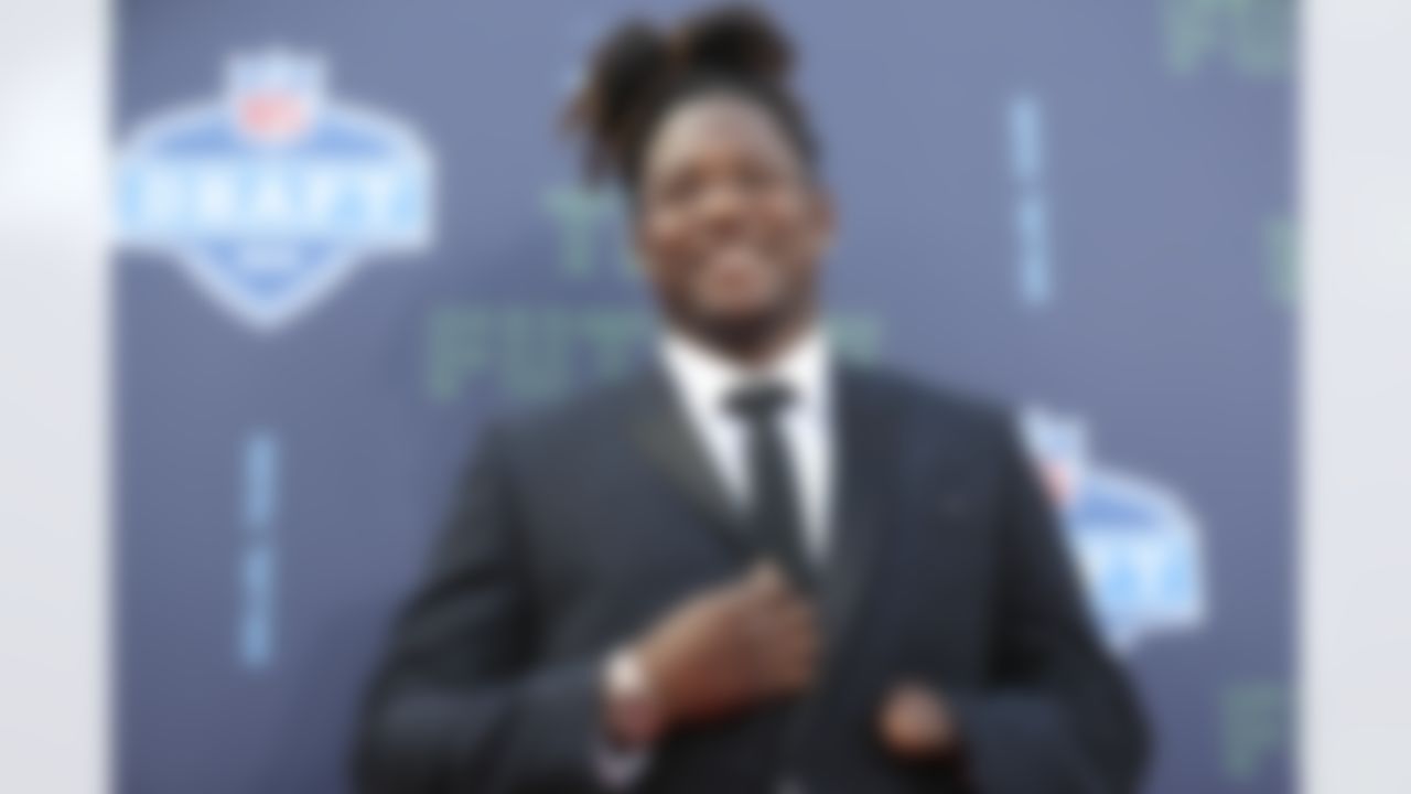 Central Florida linebacker Shaquem Griffin poses for a photo on the red carpet.