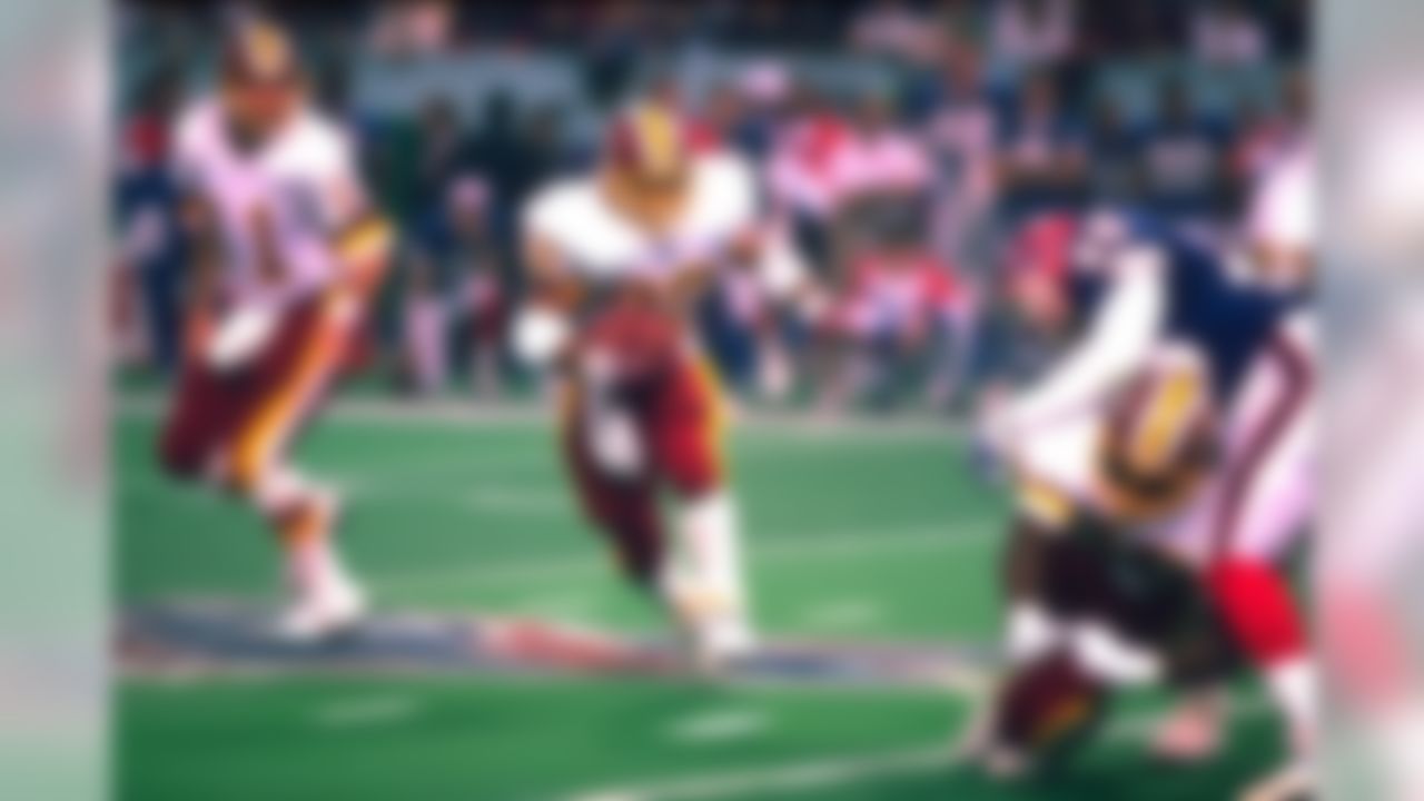 Washington Redskins running back Ricky Ervins (32) rushes upfield in a Super Bowl XXVI victory over the Buffalo Bills on January 26, 1992 in Minneapolis. (AP Photo/Al Messerschmidt)