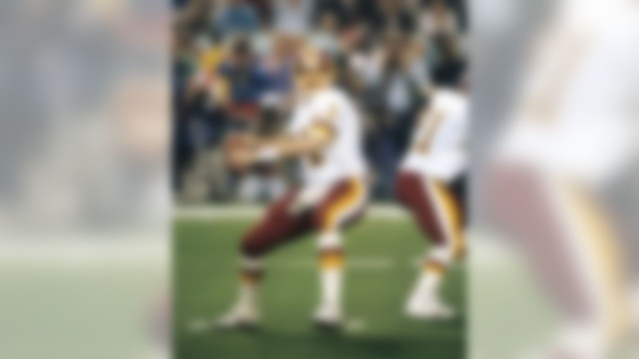Washington Redskins quarterback Mark Rypien (11) is set to throw a pass during the Redskins 37-24 victory over the Buffalo Bills in Super Bowl XXVI on January 26, 1992 at the Hubert H. Humphrey Metrodome in Minneapolis, Minnesota. (National Football League)