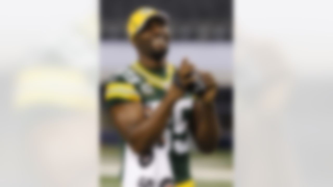 Green Bay Packers' Greg Jennings smiles as he shoots video during media day for NFL football Super Bowl XLV Tuesday, Feb. 1, 2011, in Arlington, Texas. (AP Photo/Mark Humphrey)