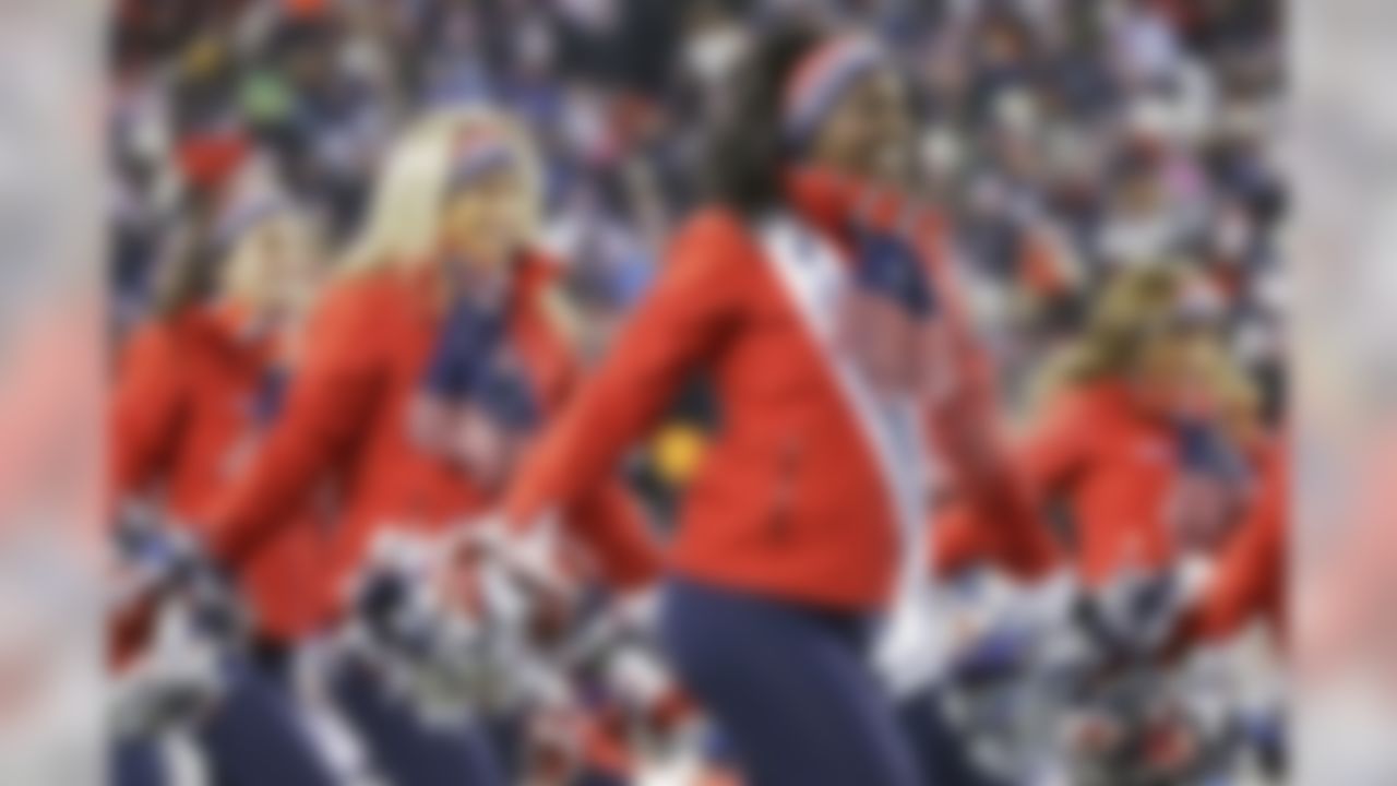 New England Patriots cheerleaders perform in the first half of an NFL divisional playoff football game against the Baltimore Ravens Saturday, Jan. 10, 2015, in Foxborough, Mass. (AP Photo/Steven Senne)