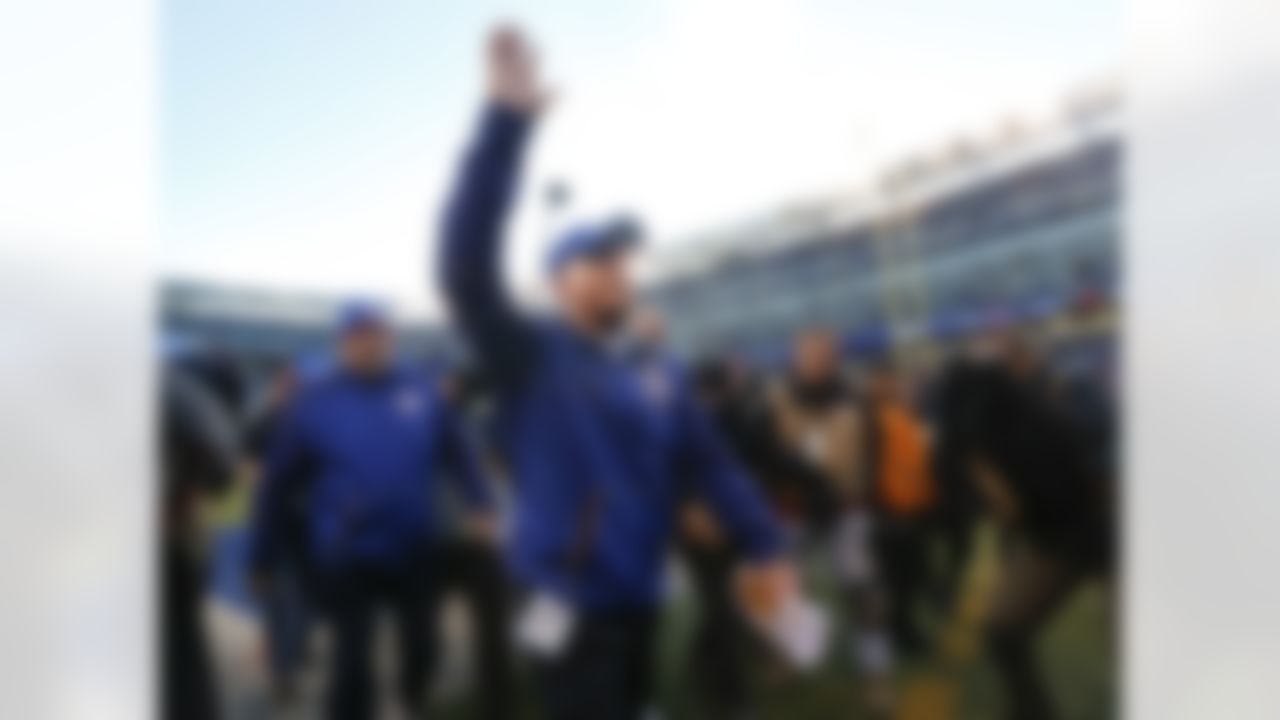 New York Giants head coach Tom Coughlin walks off the field after the Giants lost 35-30 to the Philadelphia Eagles in an NFL football game, Sunday, Jan. 3, 2016, in East Rutherford, N.J. (AP Photo/Julio Cortez)