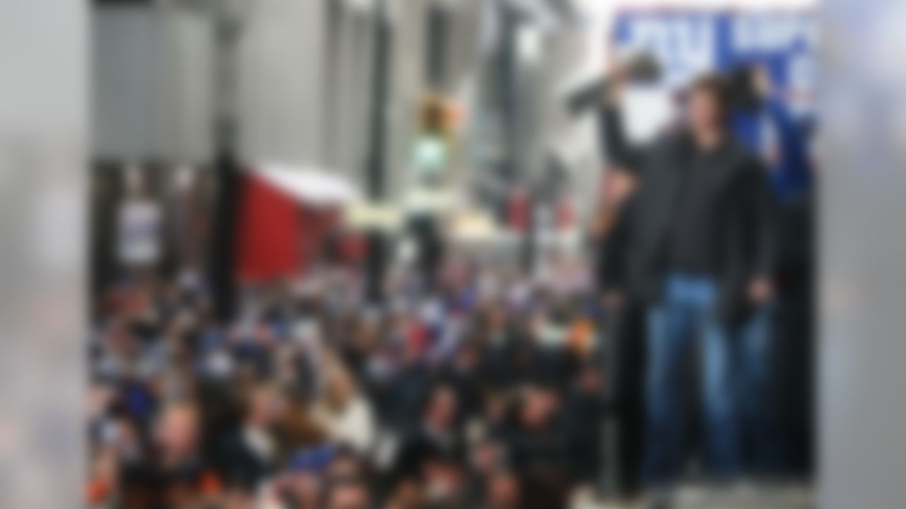 NEW YORK - FEBRUARY 05: Eli Manning of the New York Giants rides in a float along Broadway, also known as "The Canyon of Heroes" during Super Bowl XLII victory parade in New York City. (Photo by Al Bello/Getty Images)