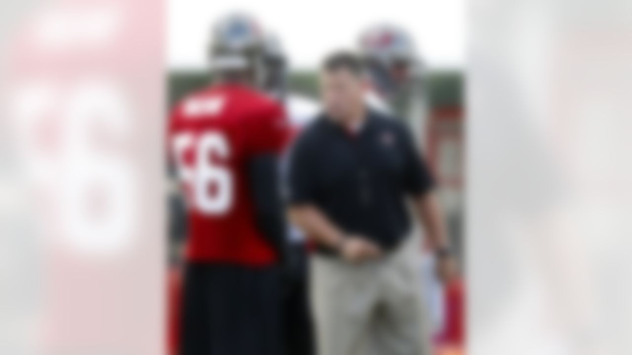 Tampa Bay Buccaneers head coach Greg Schiano talks to his team during a workout at NFL football training camp, Saturday, July 28, 2012, in Tampa, Fla. (AP Photo/Mike Carlson)