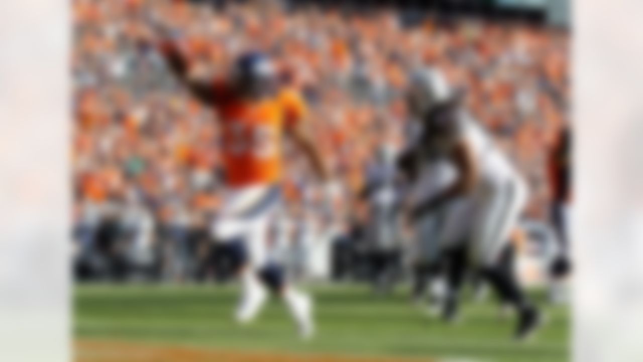 Denver Broncos running back Lance Ball celebrates his touchdown run during the NFL game between the Oakland Raiders and the Denver Broncos at the Sports Authority Field at Mile High in Denver, Colorado on September 30, 2012. (Ric Tapia/NFL)