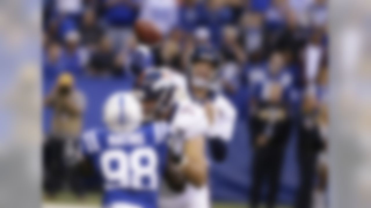 Denver Broncos quarterback Peyton Manning (18) throws during the first half of an NFL football game against the Indianapolis Colts, Sunday, Nov. 8, 2015, Indianapolis. (AP Photo/Michael Conroy)